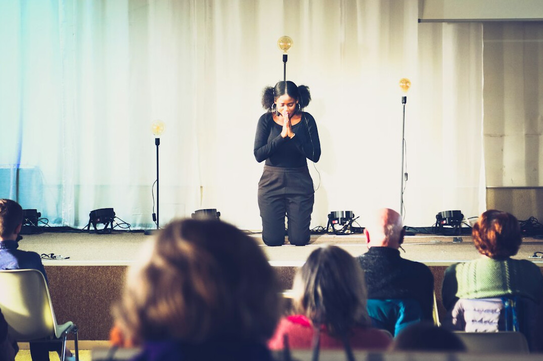 confident speaker on stage